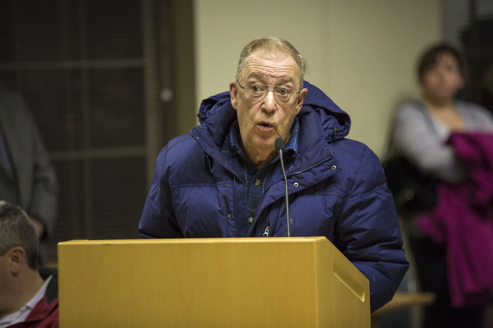 Resident Daniel Joseph Grazulis expresses his displeasure with the cemetery plan at the meeting Thursday. (Jesse Costa/WBUR)