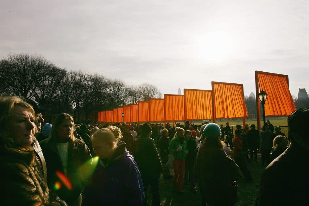 People walk through the Christo's art exhibit "The Gates," in Central Park, 2005, New York City. (Spencer Platt/Getty Images)