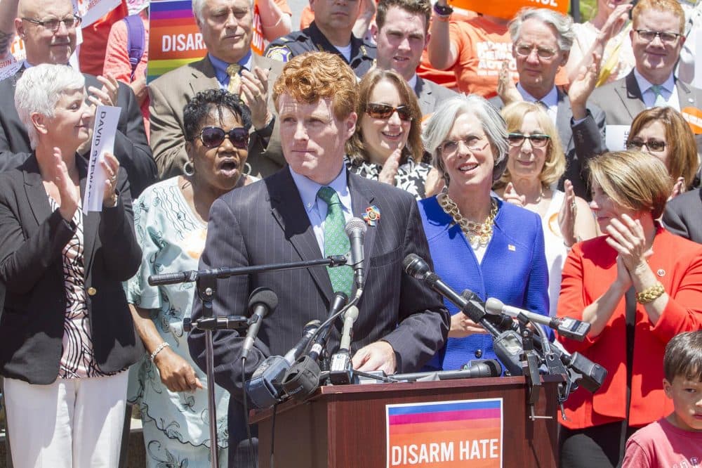 U.S. Rep. Joseph Kennedy advocates for federal gun control reforms on the State House steps in Boston. (Joe Difazio for WBUR)
