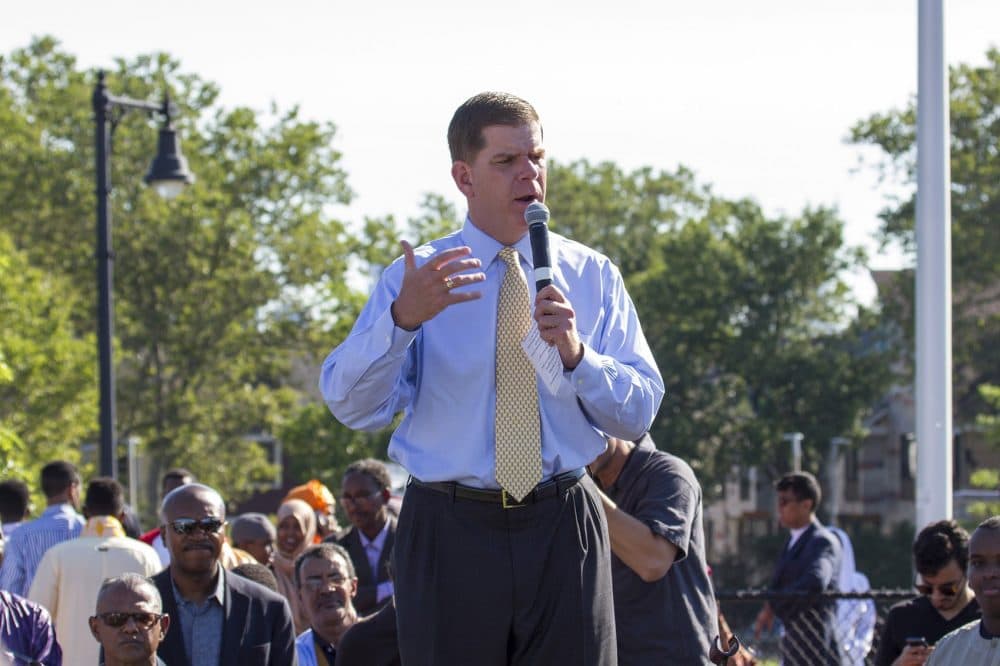 Mayor Walsh speaks at the Eid prayer service. (Joe Difazio for WBUR)