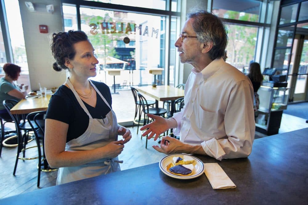The Atlantic's Corby Kummer discusses the finer points of the black and white cookie with Mamaleh’s Delicatessen co-owner and pastry chef Rachel Sundet. (Jesse Costa/WBUR)