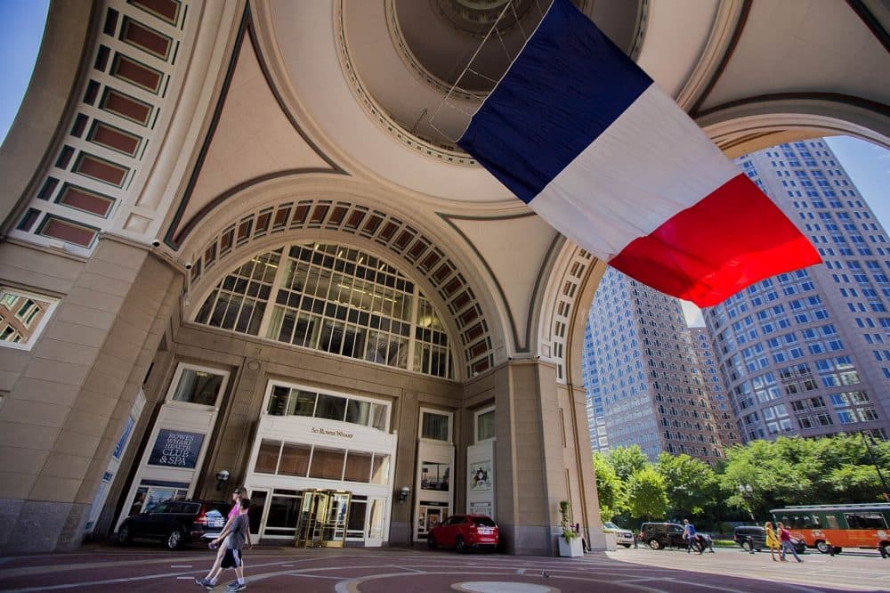 In honor of the people who died in Nice, the Boston Harbor Hotel replaced their American flag with the tricolor of France. (Jesse Costa/WBUR)