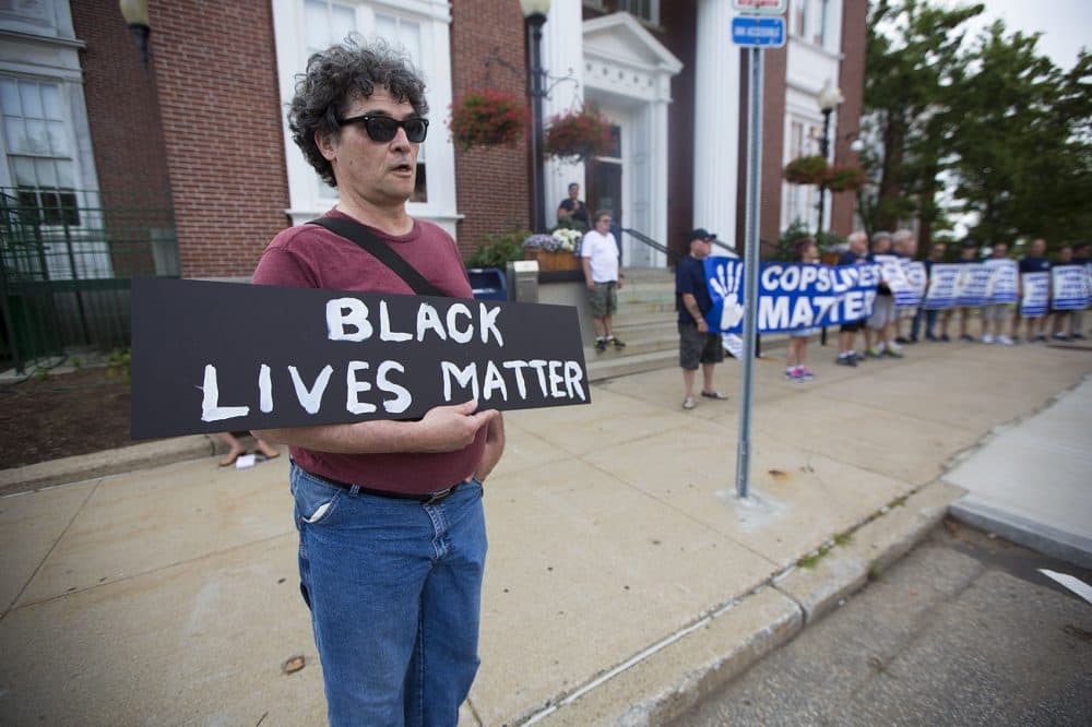 Roy Pardi, of Somerville, at the police rally in front of City Hall. (Jesse Costa/WBUR)