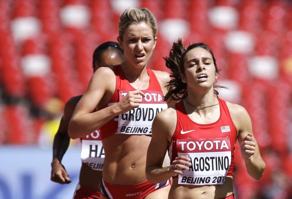 Abbey D'Agostino, right, in a round one heat of the womens 5000m at the World Athletics Championships in Beijing on Aug. 27, 2015. (David J. Phillip/AP)