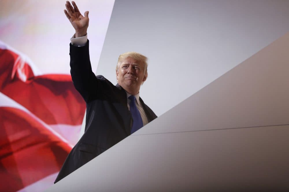 Republican presidential candidate Donald Trump waves to the crowd at the Republican National Convention Monday night in Cleveland. (John Locher/AP)