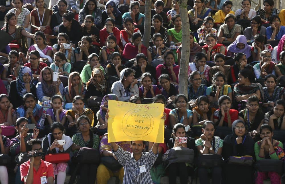 Indian students gather for a protest against Facebook’s "Free Basics" in Hyderabad, India, in December, 2015. Facebook CEO Mark Zuckerberg boasts that his 4-year-old effort to connect the developing world to the Internet has reached millions of people in some of the world’s poorest nations, but Indian regulators banned one of the pillars of the campaign, a service known as Free Basics, because it provided access only to certain pre-approved services - including Facebook - rather than the full Internet. (Mahesh Kumar/AP)