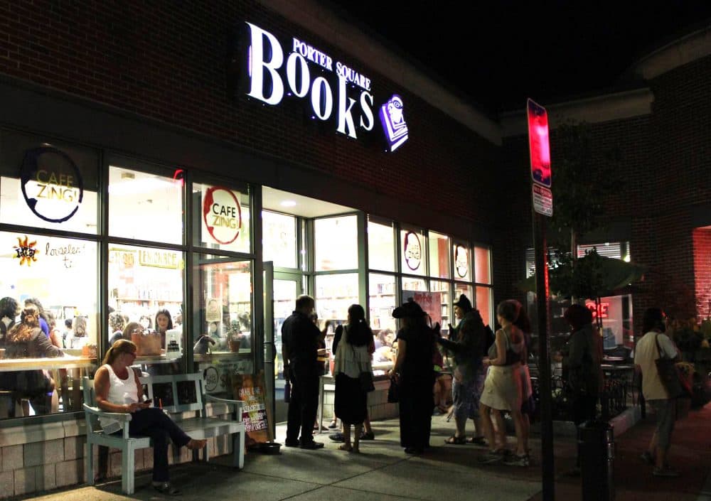 Customers line up outside of Porter Square Books in Cambridge for the midnight release of "Harry Potter and the Cursed Child." (Pete Christmann for WBUR)