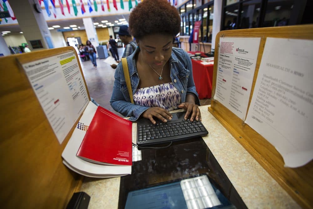 Marie Mazile, an international freshman student from Haiti, registers for classes at Bunker Hill Community College. Mazile is majoring in nursing. (Jesse Costa/WBUR)