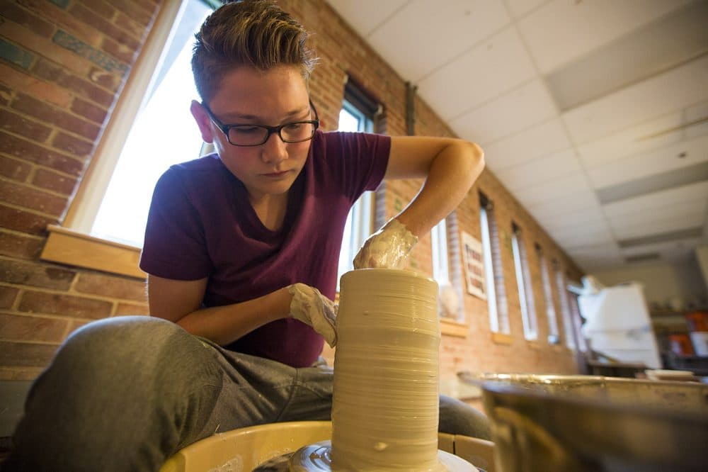 Jackson Fyfe, 16, lost his father on 9/11. For years, Jackson's mother worried that he wasn't talking about his loss. Talk therapy wasn't his thing. But they found out creating art was. (Jesse Costa/WBUR)