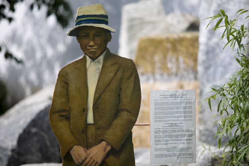 The "Laundryman" is one of the few photographs of people at work Tsen was able to find. (Jesse Costa/WBUR)