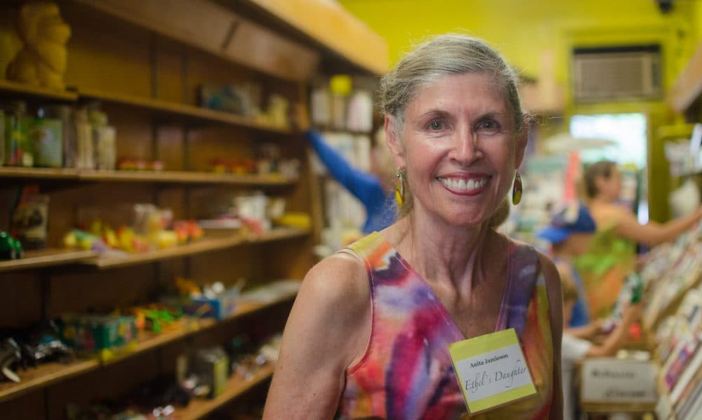 Anita Jamieson, the daughter of Ethel Weiss, in Irving's Toy and Card Shop during the final sale. Weiss owned and operated the store for 76 years, and she was on the job until days before she died last December, at the age of 101. (Sharon Brody/WBUR)