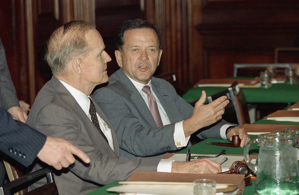 Sen. Ted Stevens (R-Alaska), right, speaks with Sen. William Proxmire (D-Wis.), during a meeting of budget conferees on Capitol Hill in Washington, on Dec. 22, 1987. The conferees decided to remove the "Fairness Doctrine" from the budget bill, one of the obstacles preventing the passage of the bill. (Doug Mills/AP)