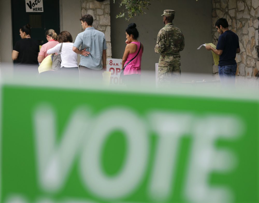 Voters wait in line to cast ballots at an early polling site, Friday, Nov. 4, 2016, in San Antonio, Texas. (Eric Gay/AP)