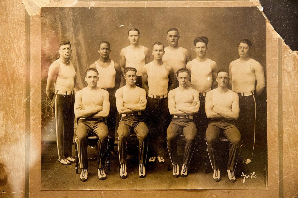 Jimmy Raye's father (left) poses with his troop of acrobats. (Robin Lubbock/WBUR)