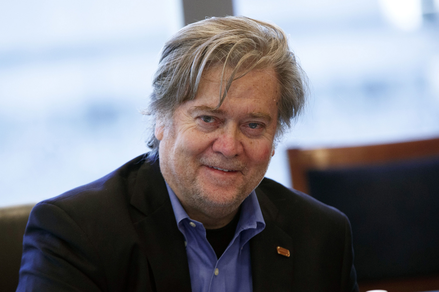 In this Oct 7, 2016 photo, Steve Bannon, former head of Breitbart News and campaign CEO for then Republican presidential candidate Donald Trump, appears at a national security meeting with advisers at Trump Tower in New York. Donald Trump’s disavowal this week of white supremacists who have cheered his election as president hasn’t quieted concerns about the movement’s impact on his White House or whether more acts of hate will be carried out in his name. (Evan Vucci/AP