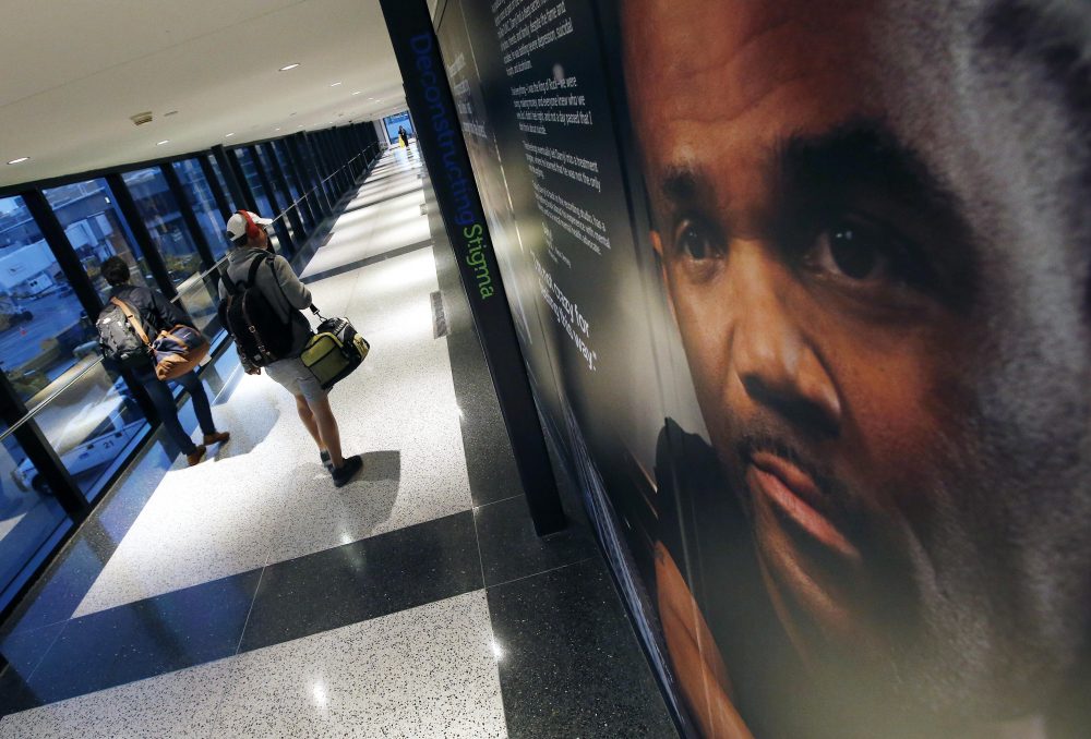 A portrait of Run-D.M.C founder Darryl McDaniels is part of the exhibit at Logan Airport. (Michael Dwyer/AP)