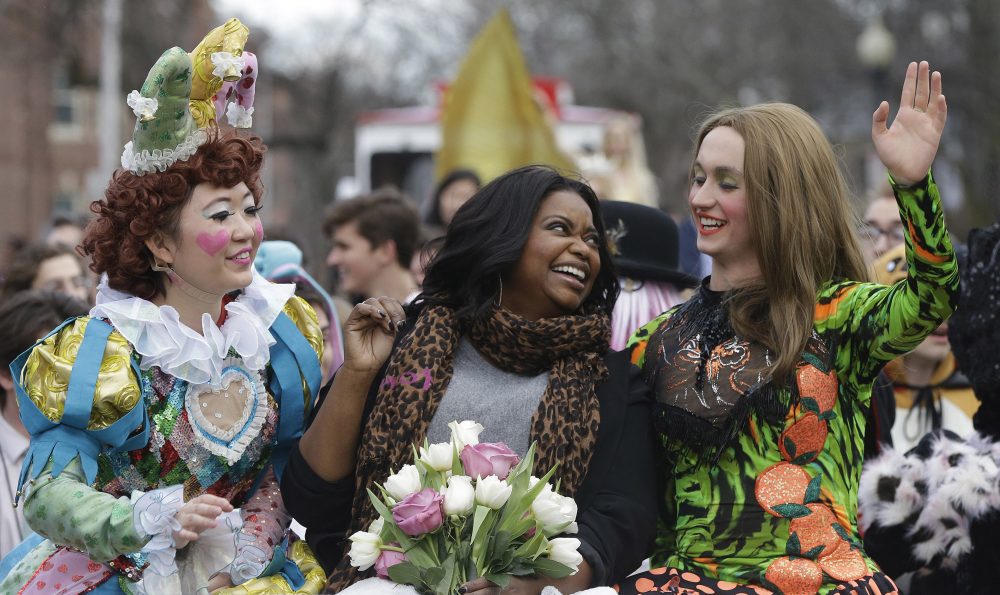 Guan-Yue Chen, Hasty Pudding Theatricals president, and Dan, Milashewski, vice president, ride with actress Octavia Spencer. (Stephan Savoia/AP)