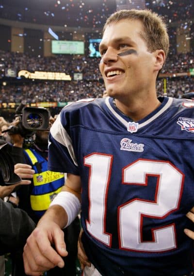 Brady smiles after the Patriots defeated the St. Louis Rams 20-17 in Super Bowl XXXVI in New Orleans in 2002. (Doug Mills/AP)