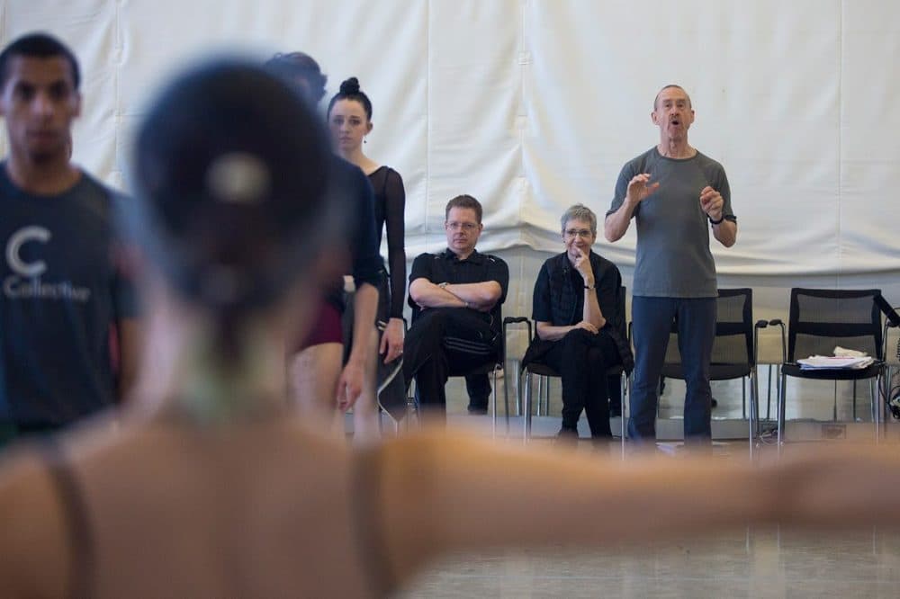 Choreographer William Forsythe, center, guides dancers through a rehearsal for "Artifact," which has its Boston premiere on Feb. 23, 2017, at the Boston Opera House. (Jesse Costa/WBUR)
