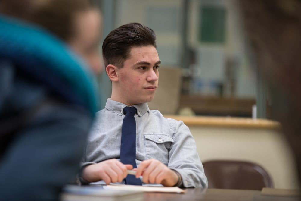 Ayman listens in his chemistry class. (Ryan Caron King for NENC)