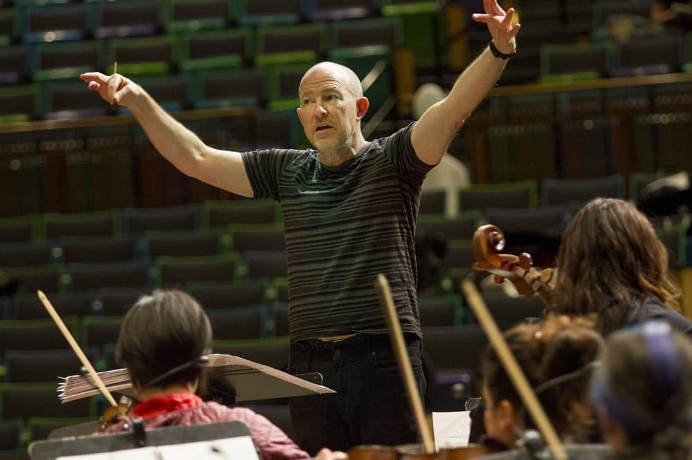 MIT professor Evan Ziporyn conducting a rehearsal of his arrangement of David Bowie's "Blackstar." (Jesse Costa/WBUR)