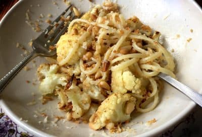 Kathy's roasted cauliflower with toasted breadcrumbs and pine nuts, over pasta. (Kathy Gunst for Here & Now)