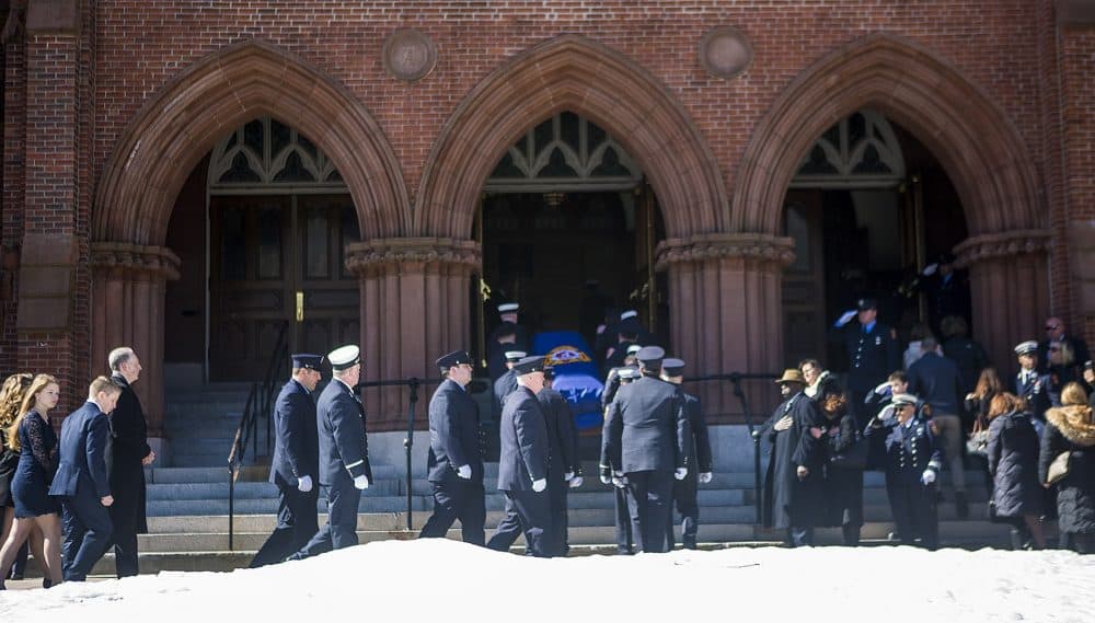 Joseph Toscano's casket is carried into St. Patrick's Church in Watertown. (Jesse Costa/WBUR)