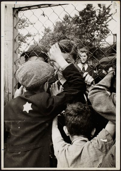 Henryk Ross photo of the Lodz Ghetto prison at Czarnecki Street, a rallying point before deportation, c. 1940-1942. (Courtesy, Museum of Fine Arts, Boston)