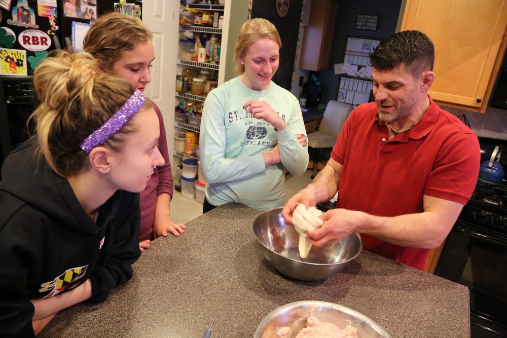 As part of his Food, People, and the Planet class, Bill Schindler invites students to work with every part of the animal to prepare the meal. (Courtesy Washington College)
