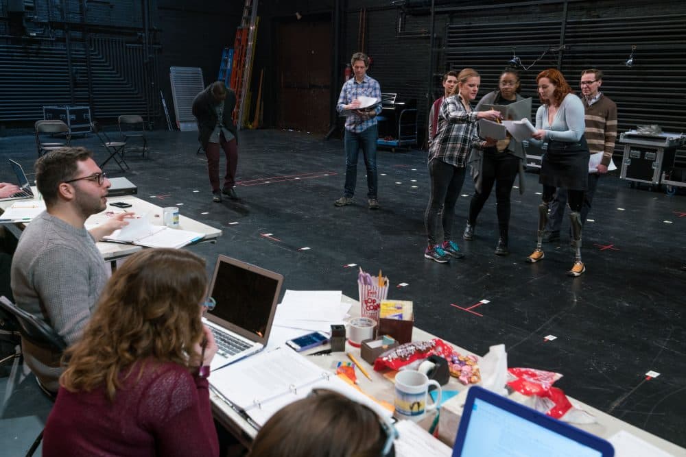 Director Joey Frangieh, who is seated on the left, looks on during a rehearsal for "Finish Line" at the Shubert Theatre. (Courtesy Nile Scott/Boch Center)
