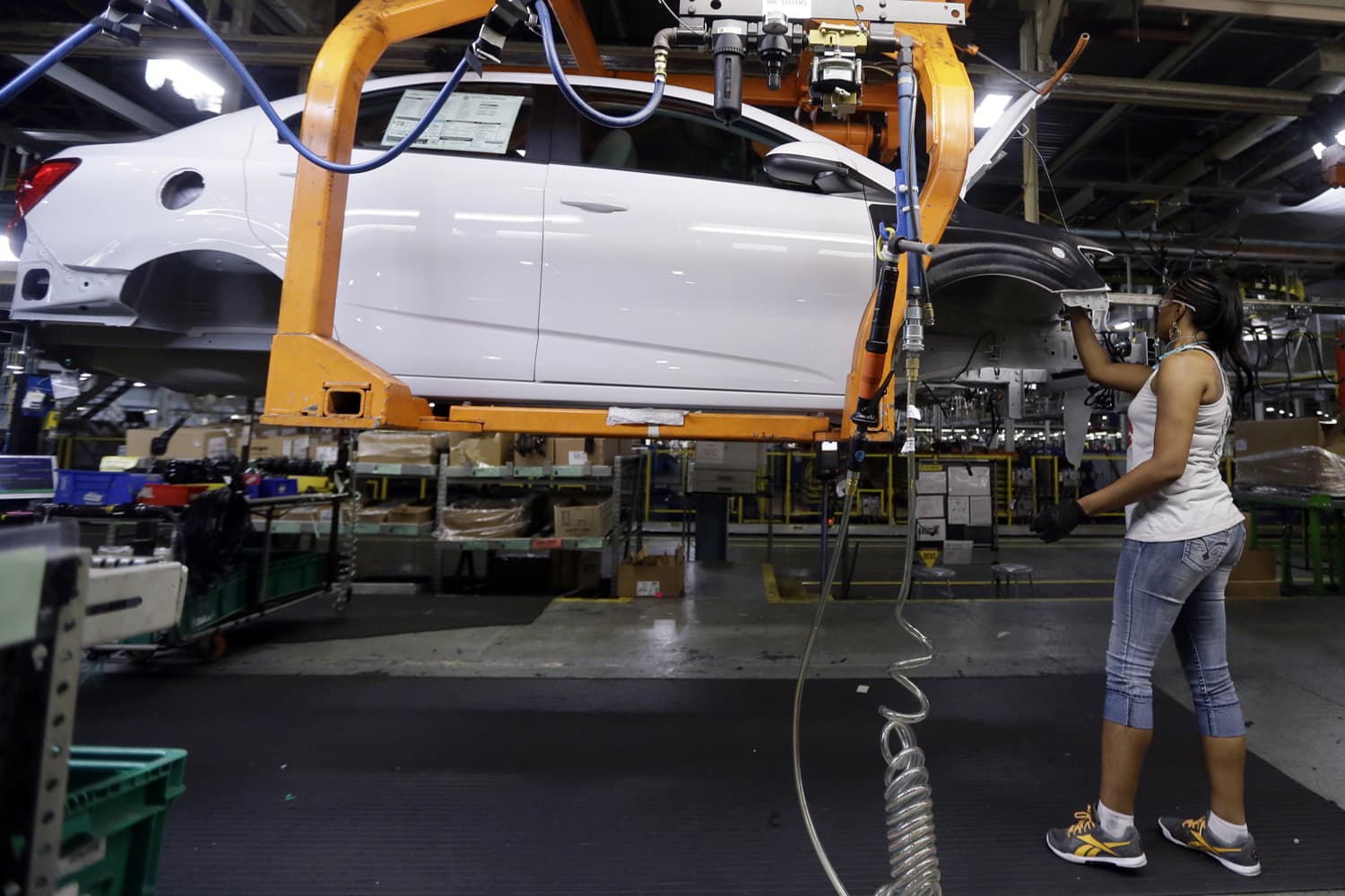 In this June 22, 2015 file photo, a Buick Verano is assembled at General Motors' Orion Assembly plant in Orion Township, Mich. (Carlos Osorio/AP)
