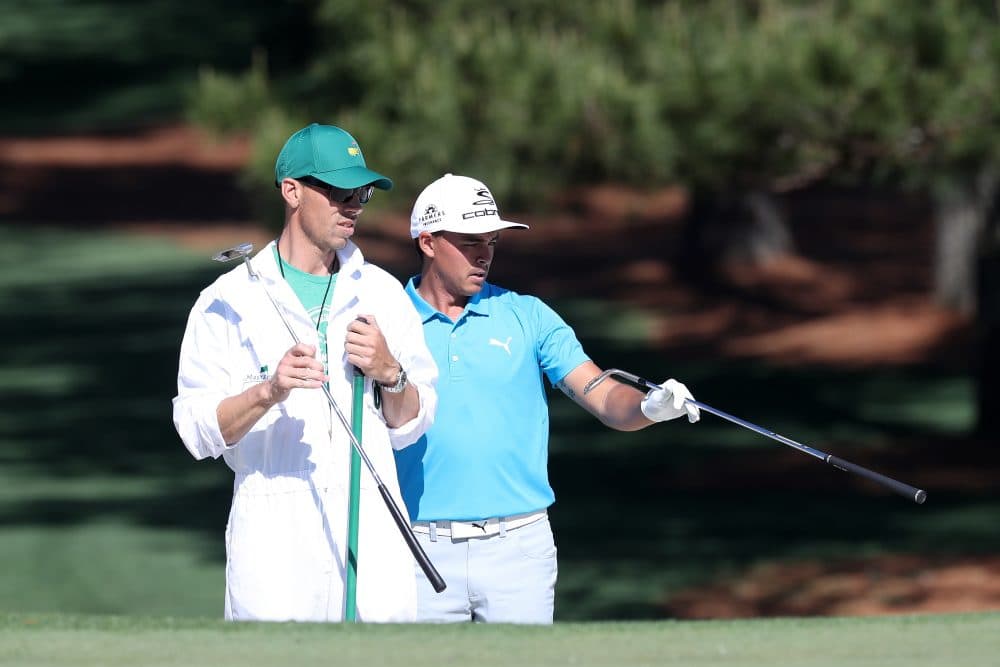 Joe Skovron and Rickie Fowler. (Rob Carr/Getty Images)