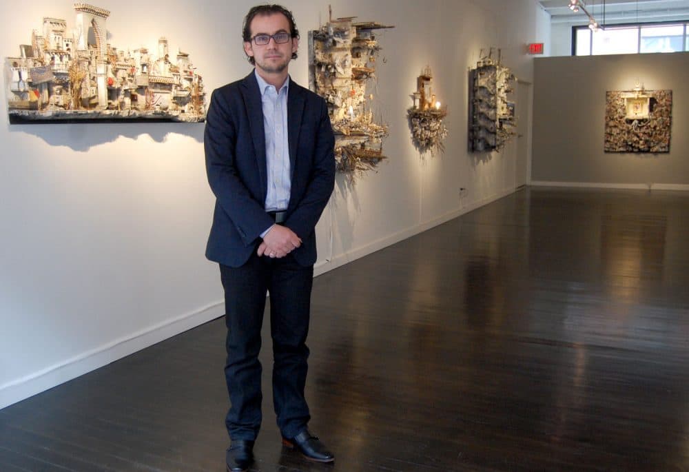 Mohamad Hafez at his exhibition “HOMELAND inSECURITY" at Boston's Lanoue Gallery. (Greg Cook/WBUR)