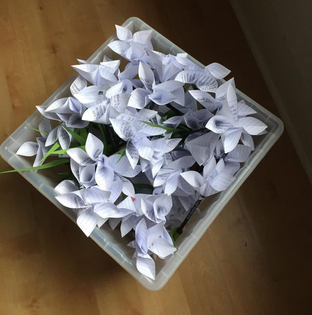 “Just Spring" (shown in progress) by Beverly poet Colleen Michaels and Beverly artist Stacy Thomas-Vickory will be an installation of 1,000 paper flowers with writing prompts inside. (Courtesy Colleen Michaels)