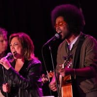 Singers Claudia Brant and Alex Cuba perform onstage during a concert in 2015. (JC Olivera/Getty Images for ASCAP, BMI, SESAC & Los Producers Charity Concert)