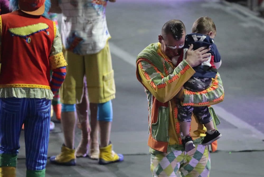 Ringling Bros. boss clown Sandor Eke hugs his 2-year-old son, Michael, after the red unit's final show on Sunday, May 7, in Providence, R.I. "The Greatest Show on Earth" is about to put on its last show on earth. (Julie Jacobson/AP)