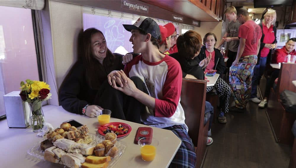 Beth Walters, left, and Stephen Craig, both clowns with Ringling Bros. and Barnum & Bailey Circus talk during the clowns' final group breakfast on May 4. (Julie Jacobson/AP)