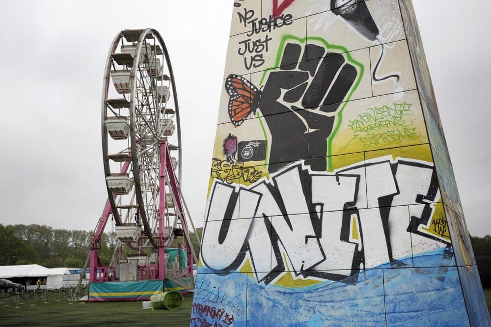 The monument and the Ferris wheel on the eve of Boston Calling. (Robin Lubbock/WBUR)