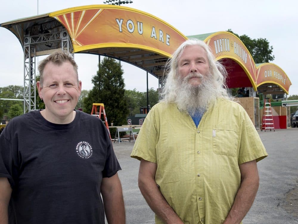 Boston Calling's Mike Snow, left, and Russ Bennett, right, at the entrance to the festival. (Andrea Shea/WBUR)