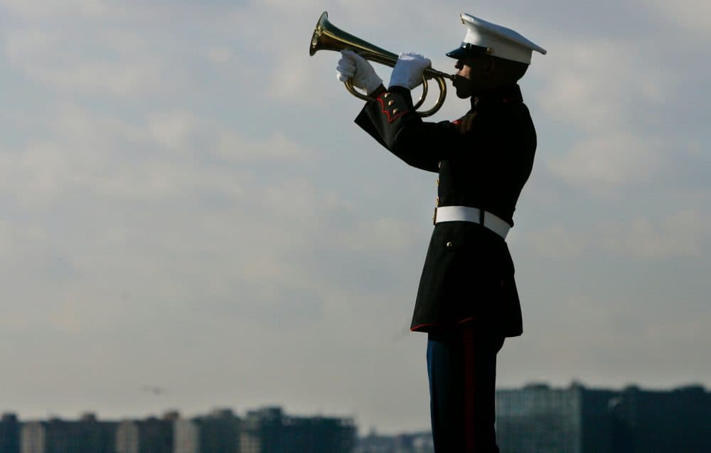 taps military bugler marine meaning corps ceremony plays history bugle during chernin stephen getty tradition veterans