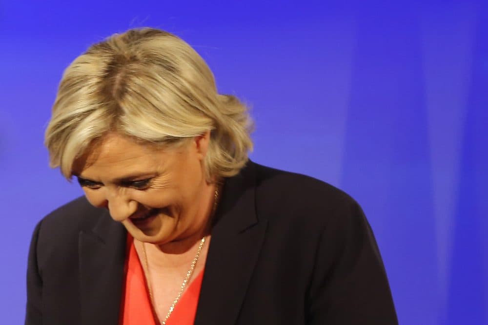 French far-right presidential candidate Marine Le Pen looks down after her speech at her election day headquarters Sunday, May 7, 2017 in Paris. Le Pen says she has called centrist Emmanuel Macron to congratulate him and says the vote confirms her National Front party and its allies as the leader of France's opposition. (Michel Euler/AP)