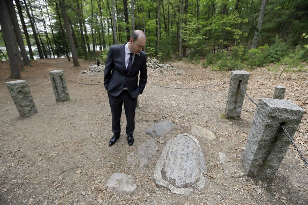 Mark Thoreau, of London, a descendant of Henry David Thoreau, visits the area at Walden Pond where Thoreau spent two years. (Elise Amendola/AP)