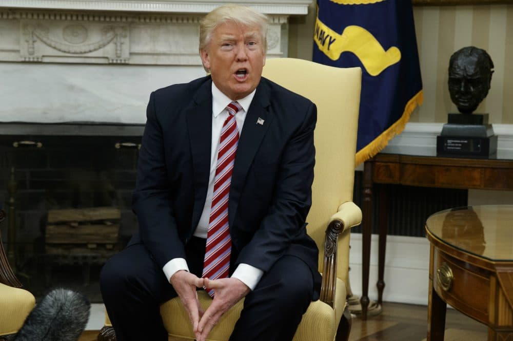 President Donald Trump talks to reporters during a meeting with former Secretary of State Henry Kissinger in the Oval Office, Wednesday, May 10, 2017. (Evan Vucci/AP)