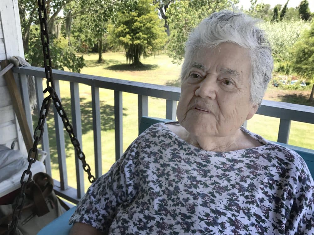 Denecia Billiot, who is in her 90s, says she will reluctantly leave the island where she and her husband Wenceslaus grew up. (Peter O'Dowd/Here & Now)