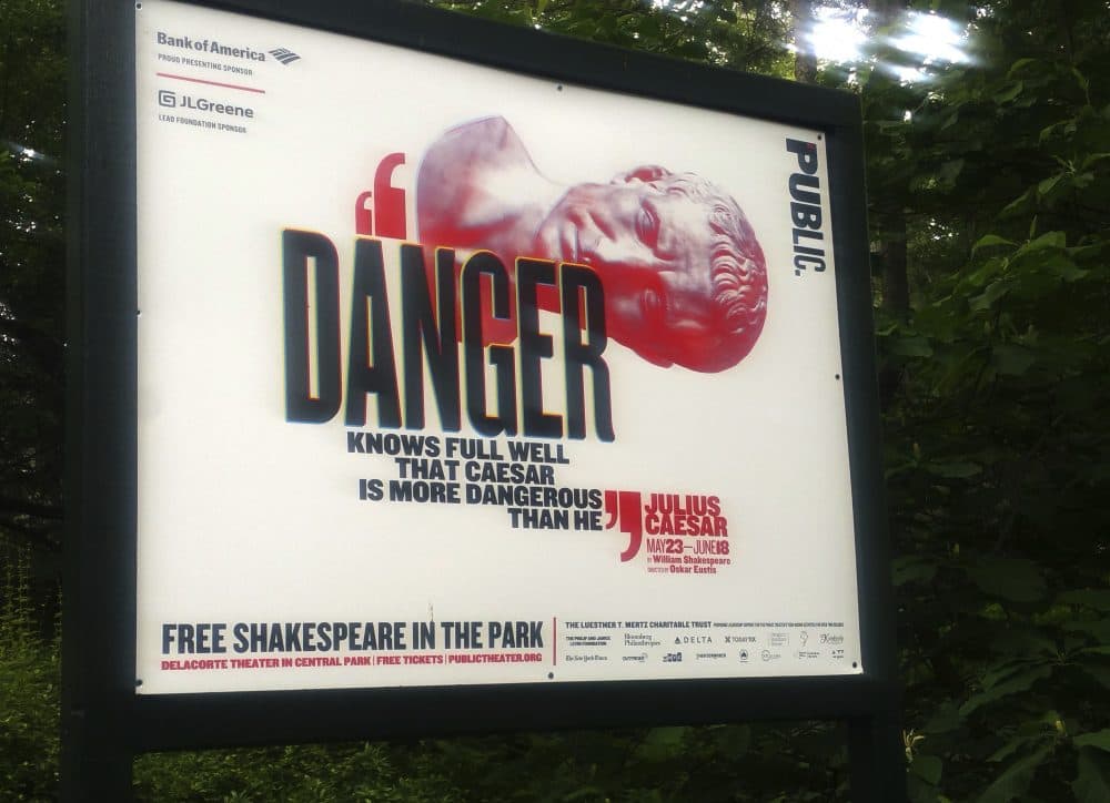 An ad for The Public Theater's production of Julius Ceasar reads: "Danger knows full well that Caesar is more dangerous than he." (Verena Dobnik/AP)