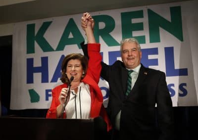 Democrats lose two more Congressional races, the Supreme Court will hear a case on gerrymandering and part of Yawkey Way becomes David Ortiz Drive. All that and more from Tom Keane’s weekly news roundup. Pictured: Republican candidate for Georgia's 6th District Congressional seat Karen Handel celebrates with her husband Steve, June 20, 2017, in Atlanta. (John Bazemore/AP)