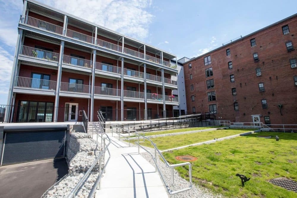 A view of the Distillery North from the rear looking from East Second Street where the old and new buildings adjoin. (Jesse Costa/WBUR)