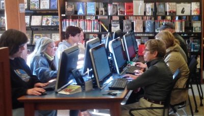 Patrons use the computers at the public library in Essex, Conn. (Courtesy Essex Library Association)