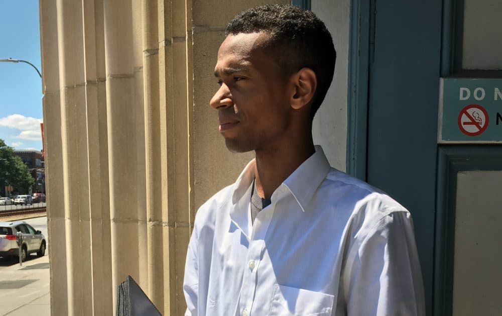Andreus Ridley, a graduating senior at UMass Amherst, of Wampanoag and Penobscot descent. (Max Larkin/WBUR)