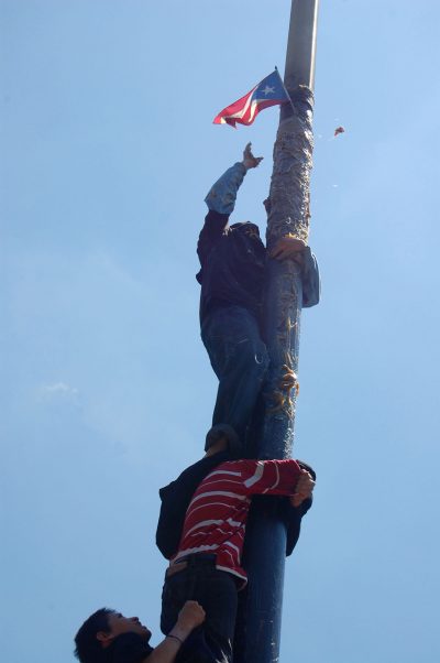 The Greased Pole Tournament at Villa Victoria’s Festival Betances in 2010. (Greg Cook/WBUR)